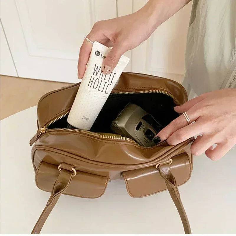 SLEEK DISTRESSED LEATHER CARRY